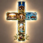 The Story Cross lit up on a wall, showing six scenes from the life of Christ